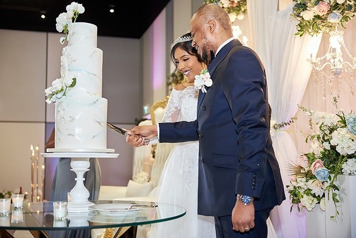 Vanita and Joseph wedding. Halifax wedding photography. Cedar Event Center. Halifax weddings. Cutting Cake